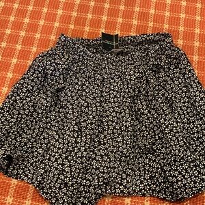 Brandy Melville skirt. New with tags. One size.
